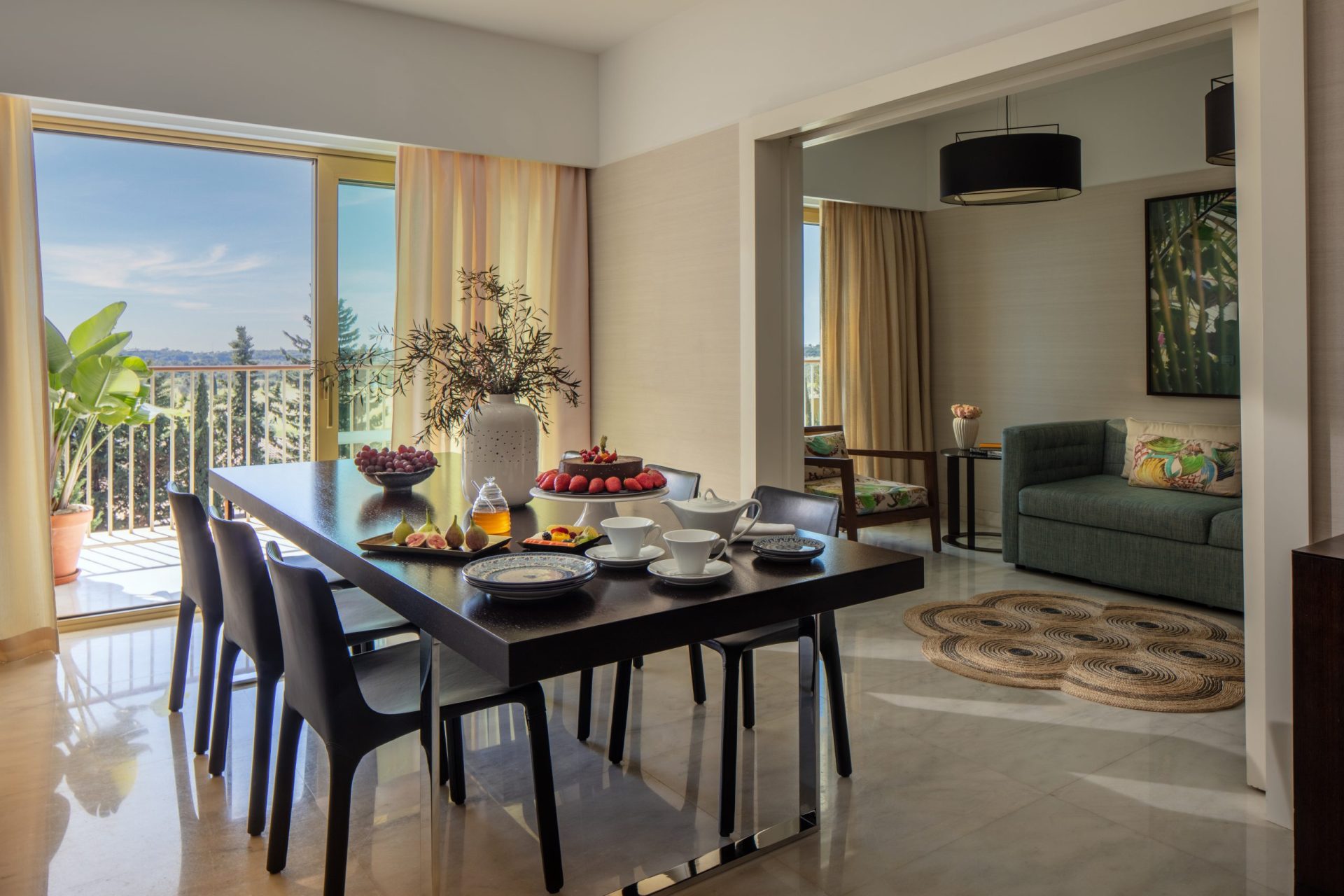 Victoria_Golf_Resort_&_Spa_Victoria_Suite_Wide_Hero_Dining_Living_and_Terrace_Area