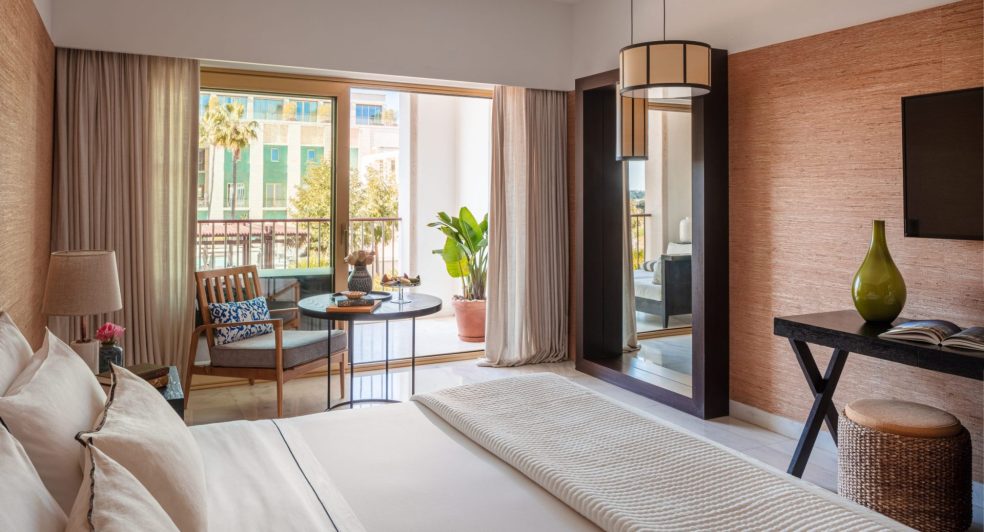 Victoria_Golf_Resort_&_Spa_Palms_Suite_Over_Bed_To_Balcony