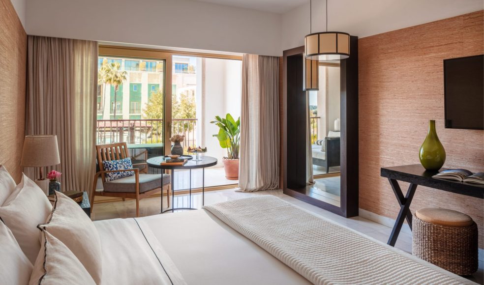 Victoria_Golf_Resort_&_Spa_Palms_Suite_Over_Bed_To_Balcony